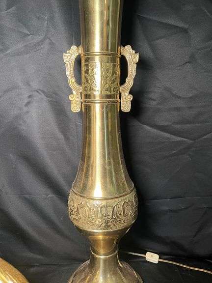 Brass lamp and brass toned plastic peacock decor