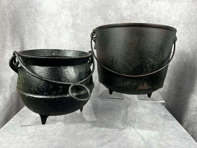 2 unbranded cast iron pots