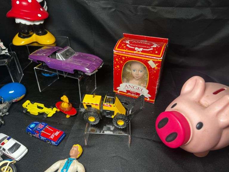 Tabletop of model cars, various toys