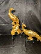 Brass lamp and brass toned plastic peacock decor