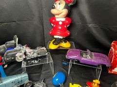 Tabletop of model cars, various toys