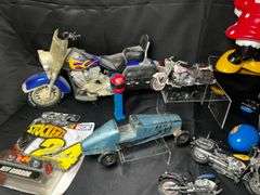 Tabletop of model cars, various toys