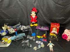 Tabletop of model cars, various toys