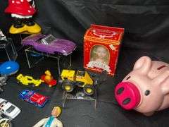 Tabletop of model cars, various toys