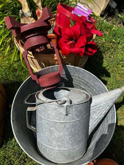 Water can, galvanized bucket and garden decor