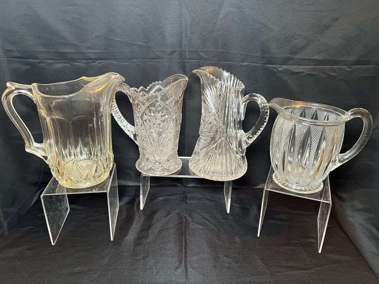 4 clear glass pitchers