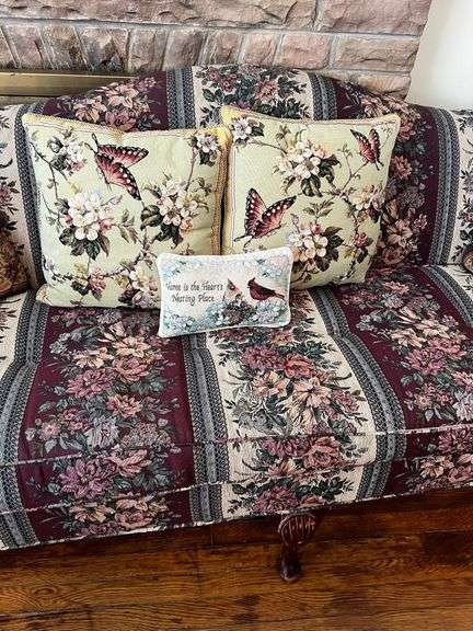 Upholstered floral print sofa