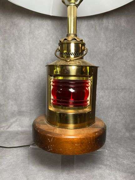 Nautical themed table lamp with red globe