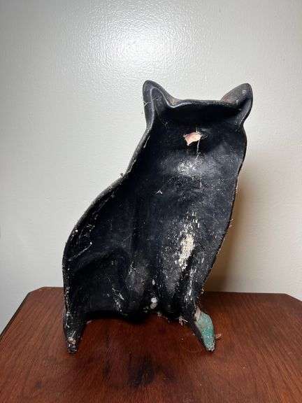 Cast metal cat door stop