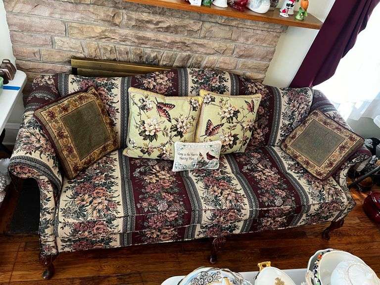 Upholstered floral print sofa