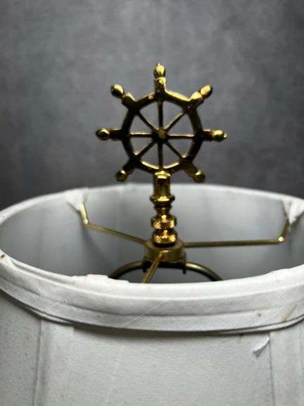 Nautical themed table lamp with red globe