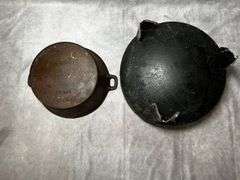 2 cast iron pots