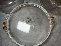 Mikasa cake plate and unmatching lids