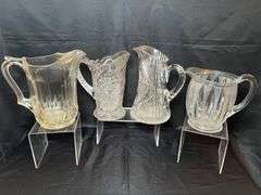 4 clear glass pitchers