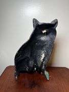 Cast metal cat door stop