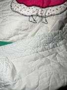 Full size machine stitched quilt