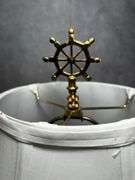 Nautical themed table lamp with red globe