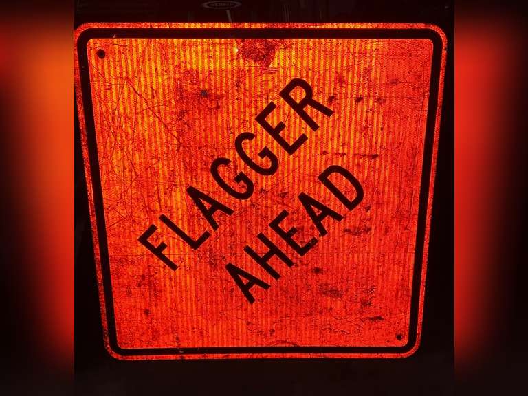 Large flagger ahead, construction sign - Northern Kentucky Auction, LLC
