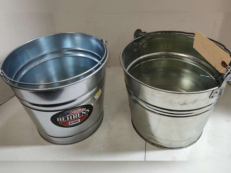 Two galvanized buckets one near new the other shows wear Northern
