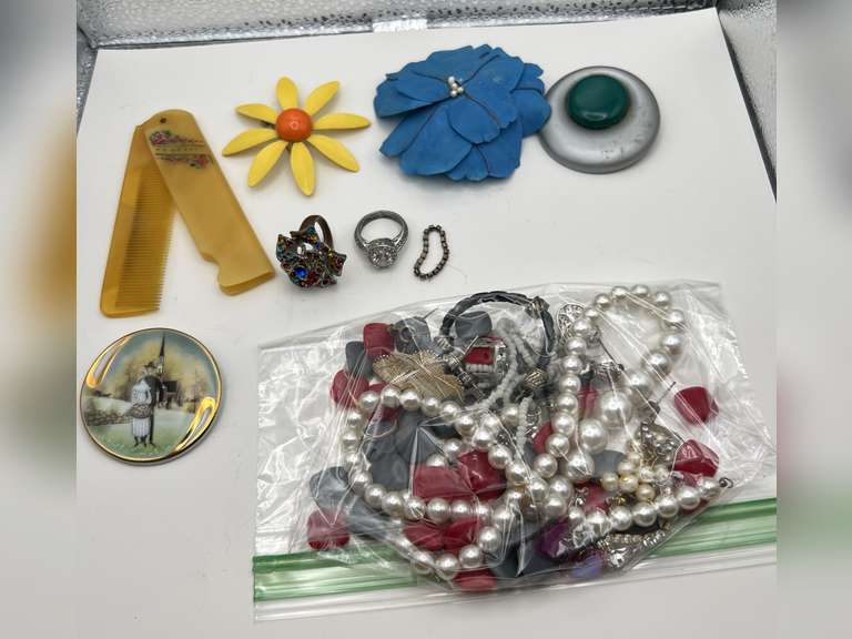 Assorted pieces of costume jewelry, vintage comb, hand painted pin and