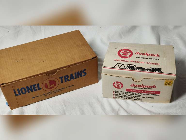 Dual pack train control untested and a box of Lionel paperwork two bags of Lionel Coal