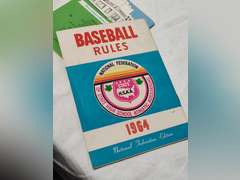 1970s White Castle Bridge score book and 1964 baseball rule book