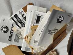 Dual pack train control untested and a box of Lionel paperwork two bags of Lionel Coal