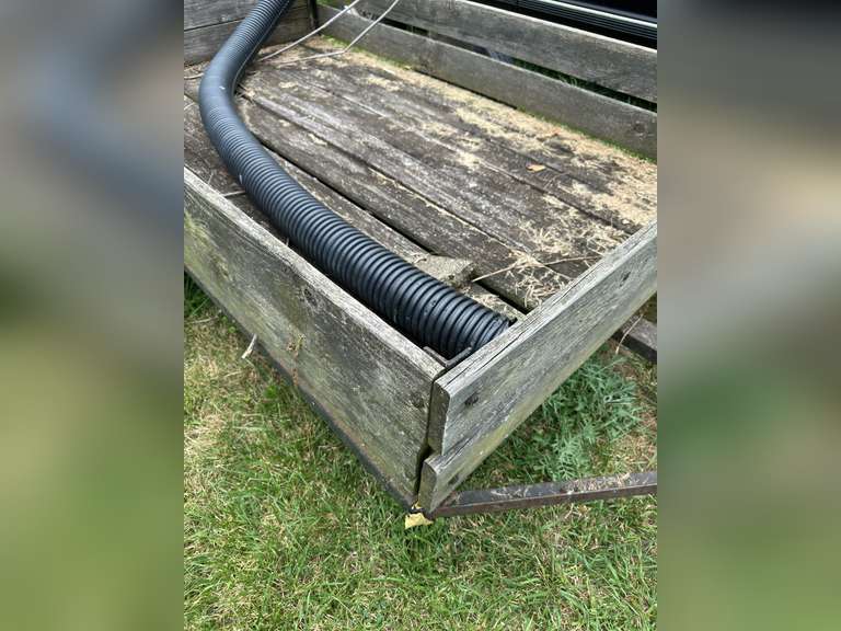 Farm trailer, has flat tires, no title. Not roadworthy.