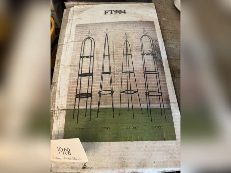 Three boxes with metal plant stands
