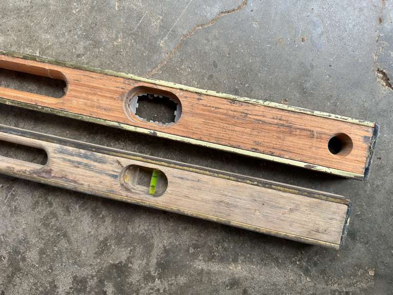 Two, 4 foot levels. One is damaged.