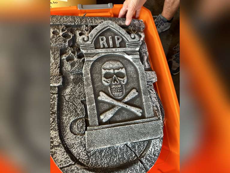 Halloween cemetery headstones and a Mickey Mouse basket