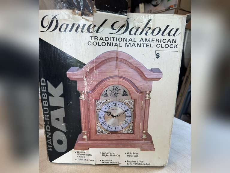 Mantle clock still in the box, we did not remove from box