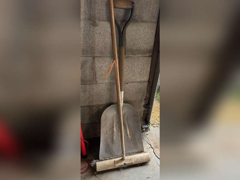 Aluminum scoop shovel and a pushbroom