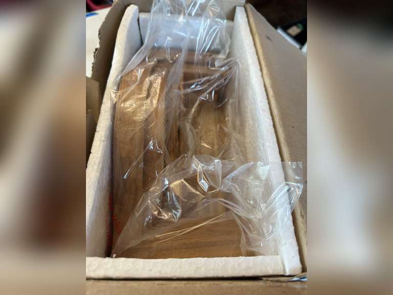 Mantle clock still in the box, we did not remove from box