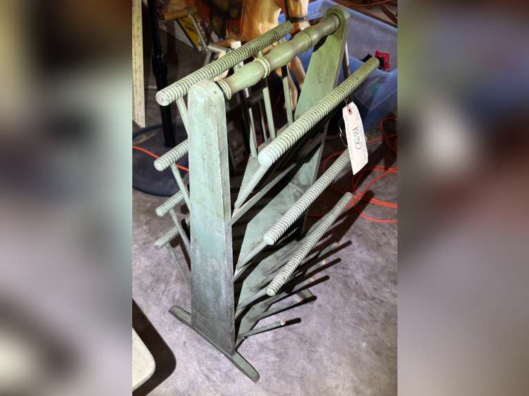 Vintage magazine stand, missing one of the decorative top pieces shown in photos. It is 30 inches tall by 12 inches wide by 12 1/2 inches deep.