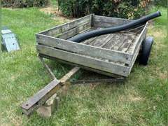 Farm trailer, has flat tires, no title. Not roadworthy.