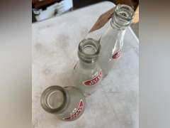 3 Big Red commemorative bottles for 1980 National Champion Louisville Cardinals