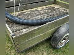 Farm trailer, has flat tires, no title. Not roadworthy.