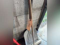 Aluminum scoop shovel and a pushbroom