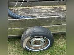 Farm trailer, has flat tires, no title. Not roadworthy.