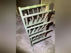 Vintage magazine stand, missing one of the decorative top pieces shown in photos. It is 30 inches tall by 12 inches wide by 12 1/2 inches deep.
