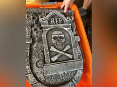 Halloween cemetery headstones and a Mickey Mouse basket