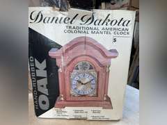 Mantle clock still in the box, we did not remove from box