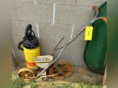 Garden seeder and a tank sprayer