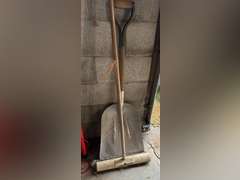 Aluminum scoop shovel and a pushbroom