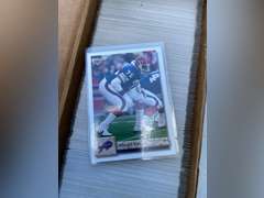 7 Boxes & 3 sandwich bags of collectible football cards.