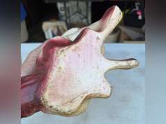 Chalk ware dogs, one is a bank