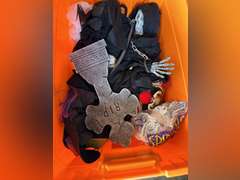 Halloween cemetery headstones and a Mickey Mouse basket