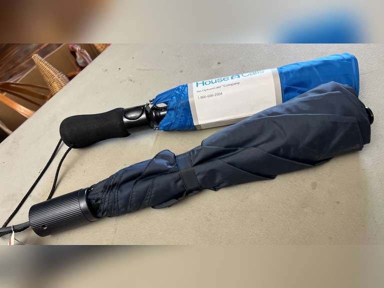 2 Folding umbrellas.