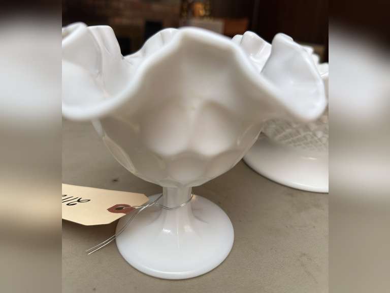 Two, ruffled edge glass pieces